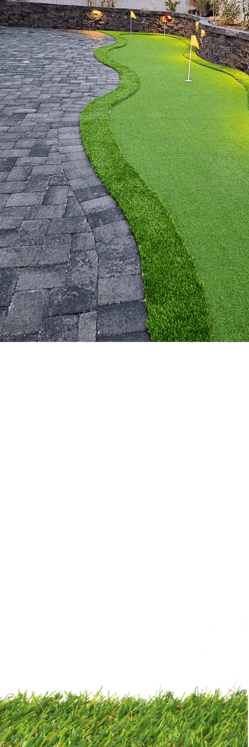 Paver patio beside an artificial turf putting green