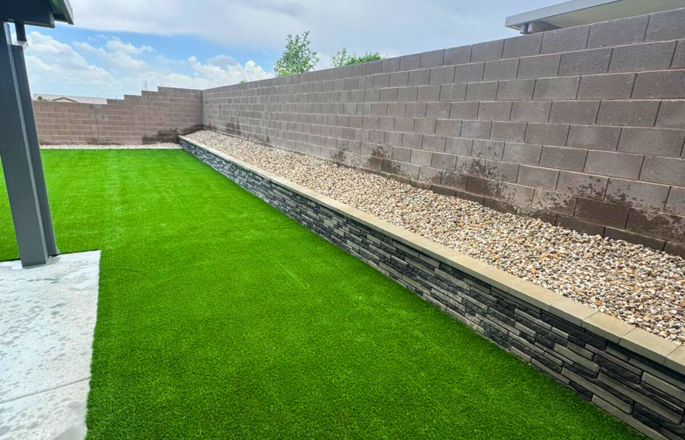 Engineered retaining wall for structure and elevation